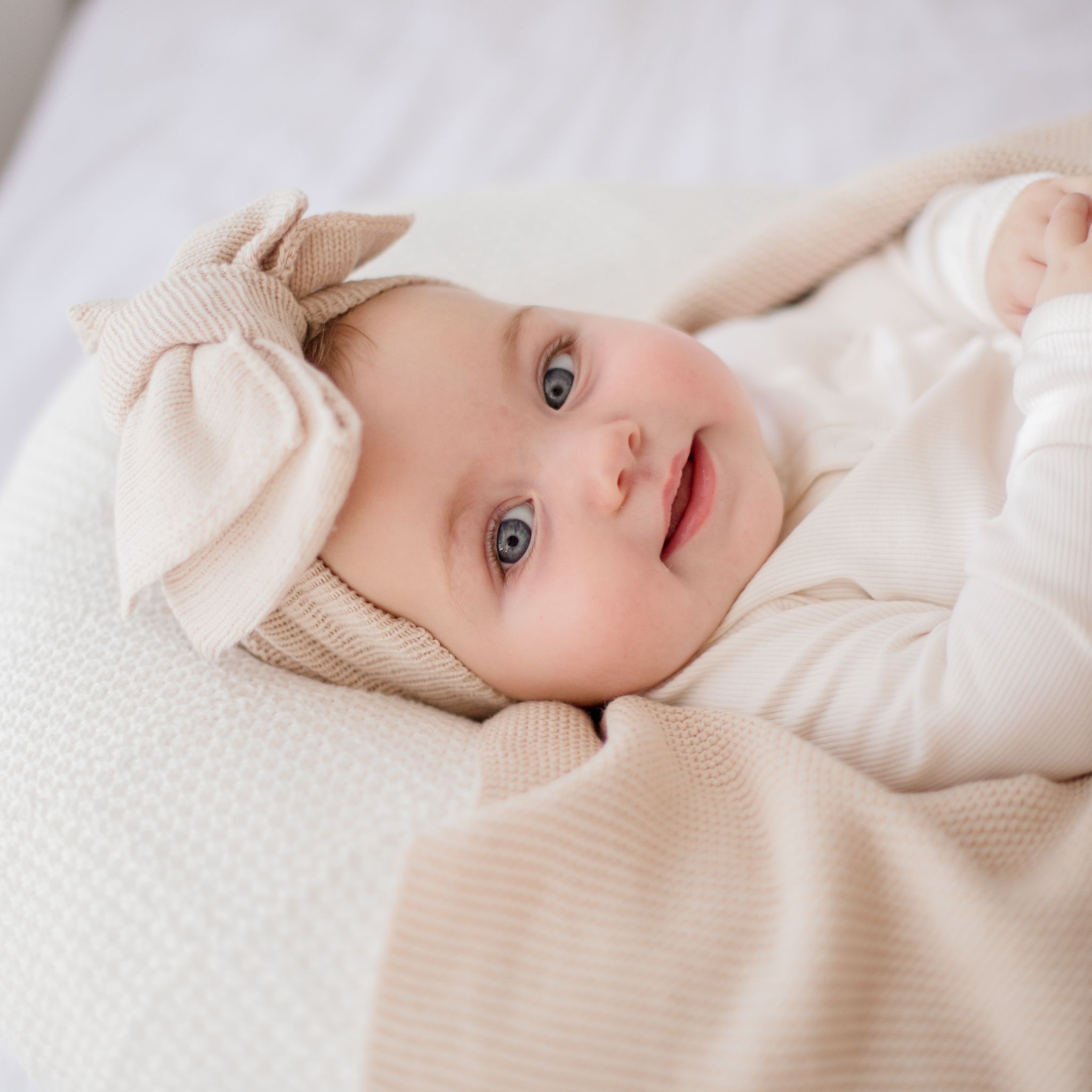 How to Choose the Perfect Knitted Oversized Topknot for Your Baby: Colour & Fabric Guide