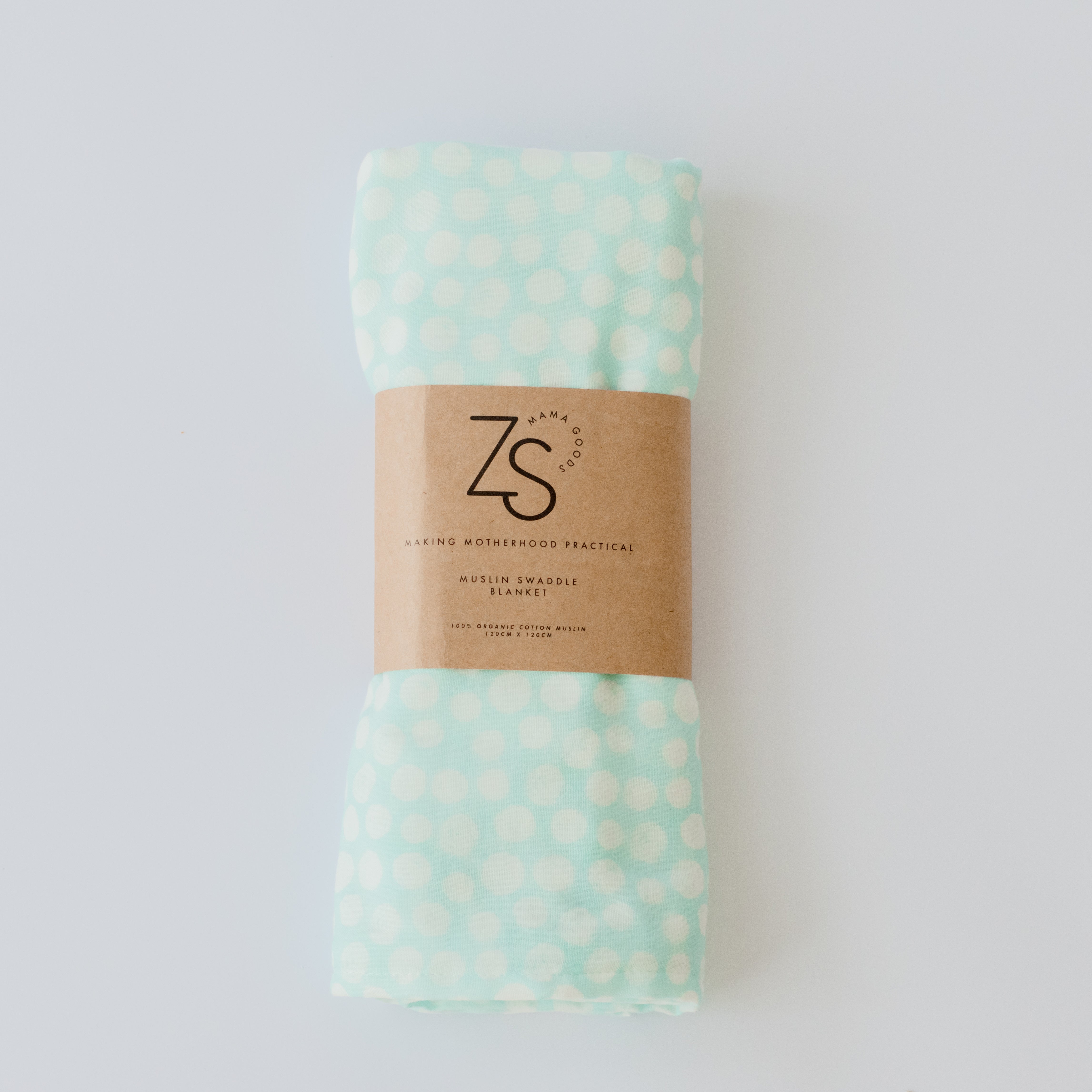 Mint Whirl organic cotton muslin swaddle wrap folded and displayed