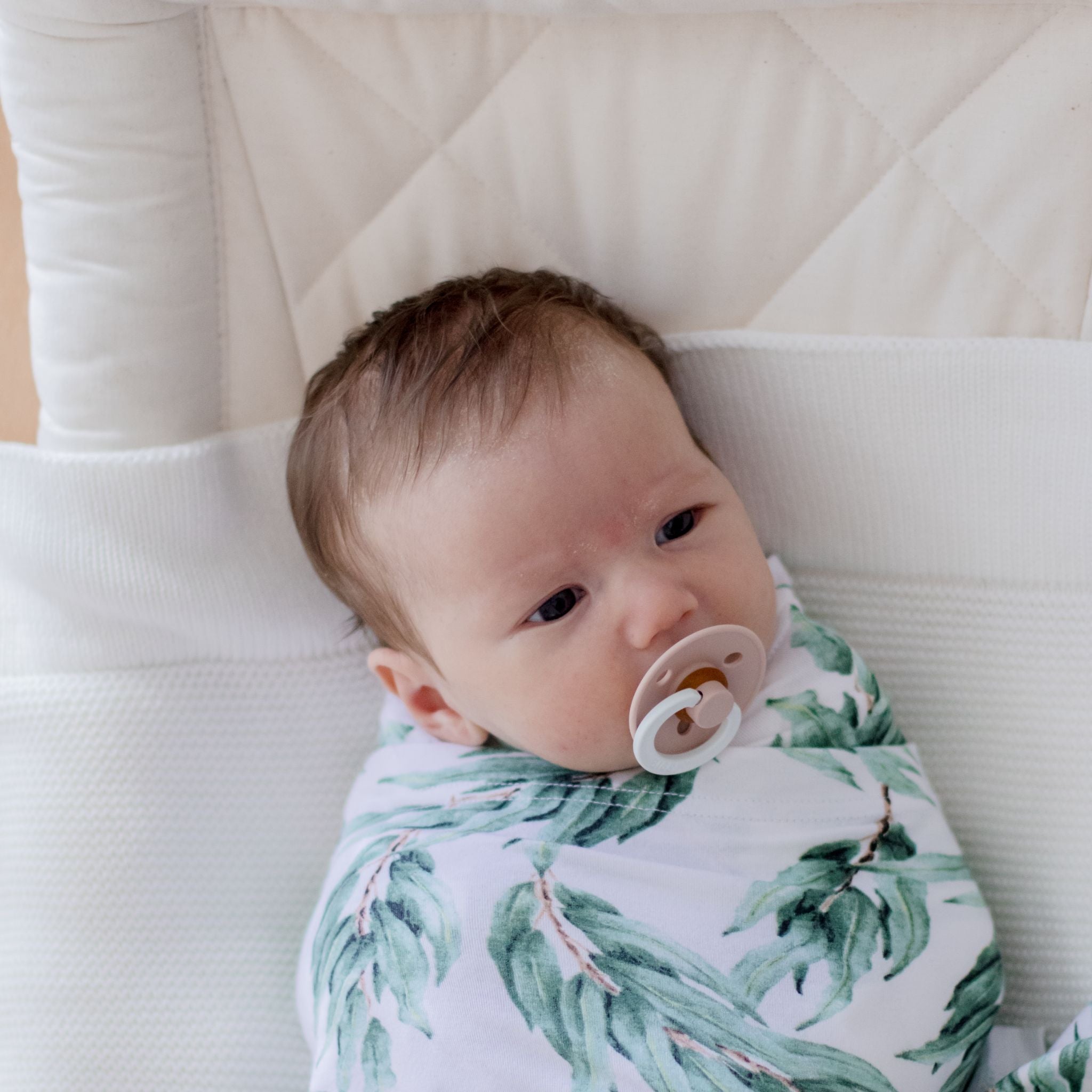 Blue eucalyptus patterned stretchy baby swaddle wrap folded display