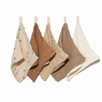 Five organic muslin wash cloths in dusty dunes color by Zoe Sage