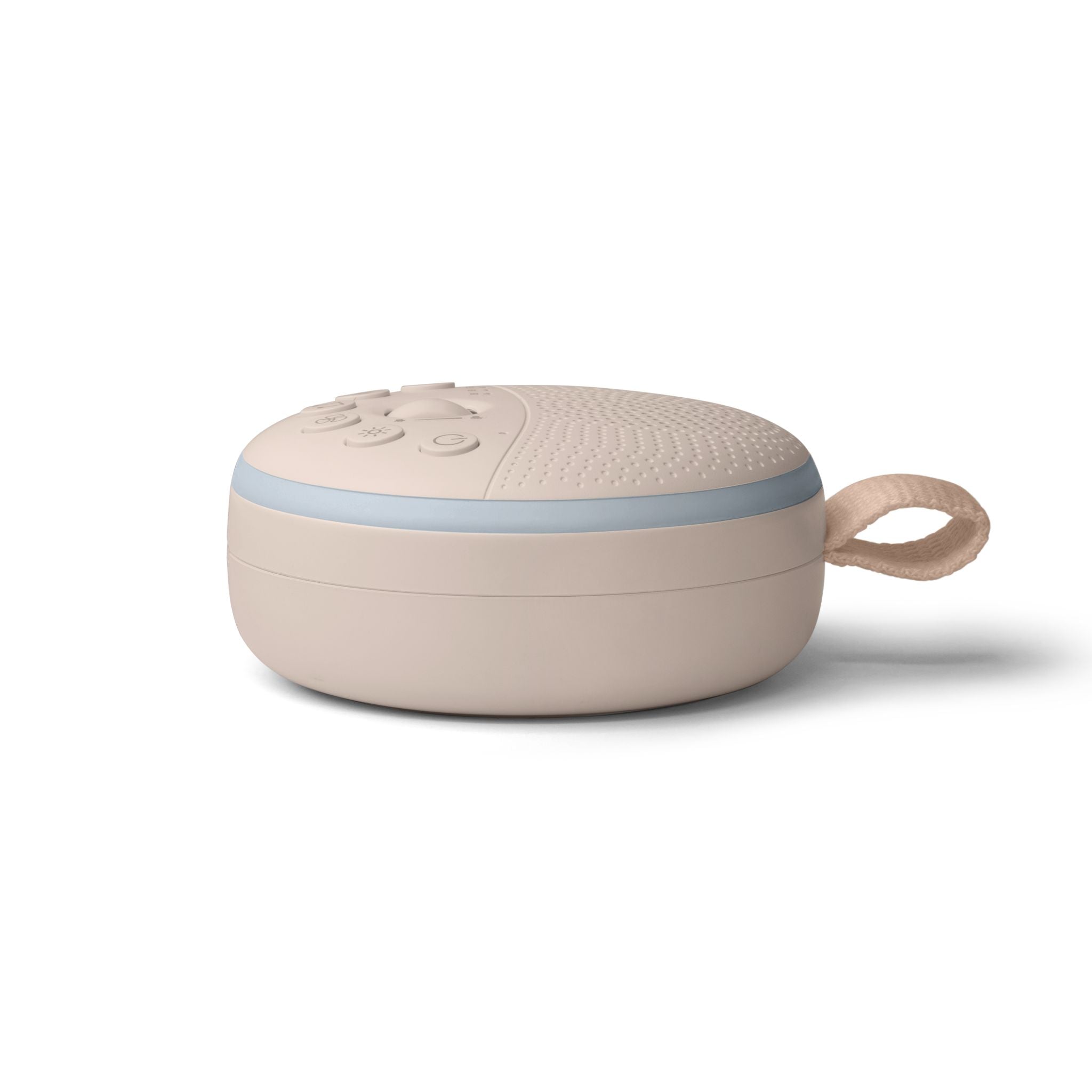 Portable white noise machine in soft sandrift colour with gentle night light glow