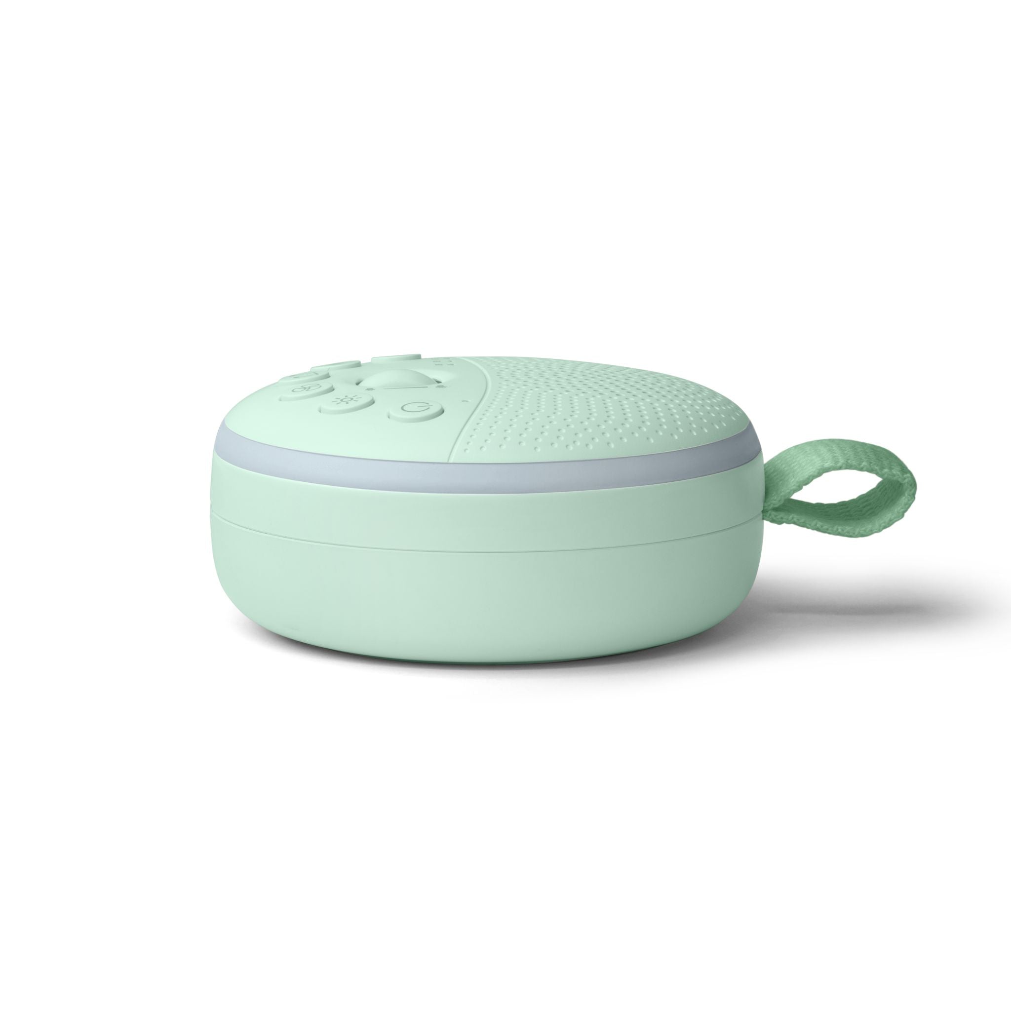 Portable white noise machine and night light in soft cove green, side view angle