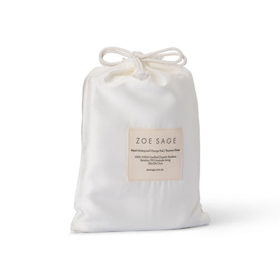 White waterproof bamboo fitted bassinet sheet and change pad cover by Zoe Sage