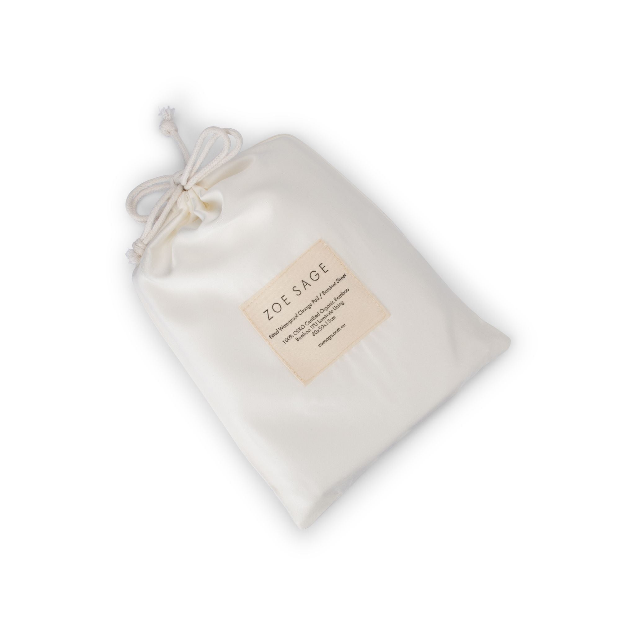 White waterproof fitted bassinet sheet on changing pad surface