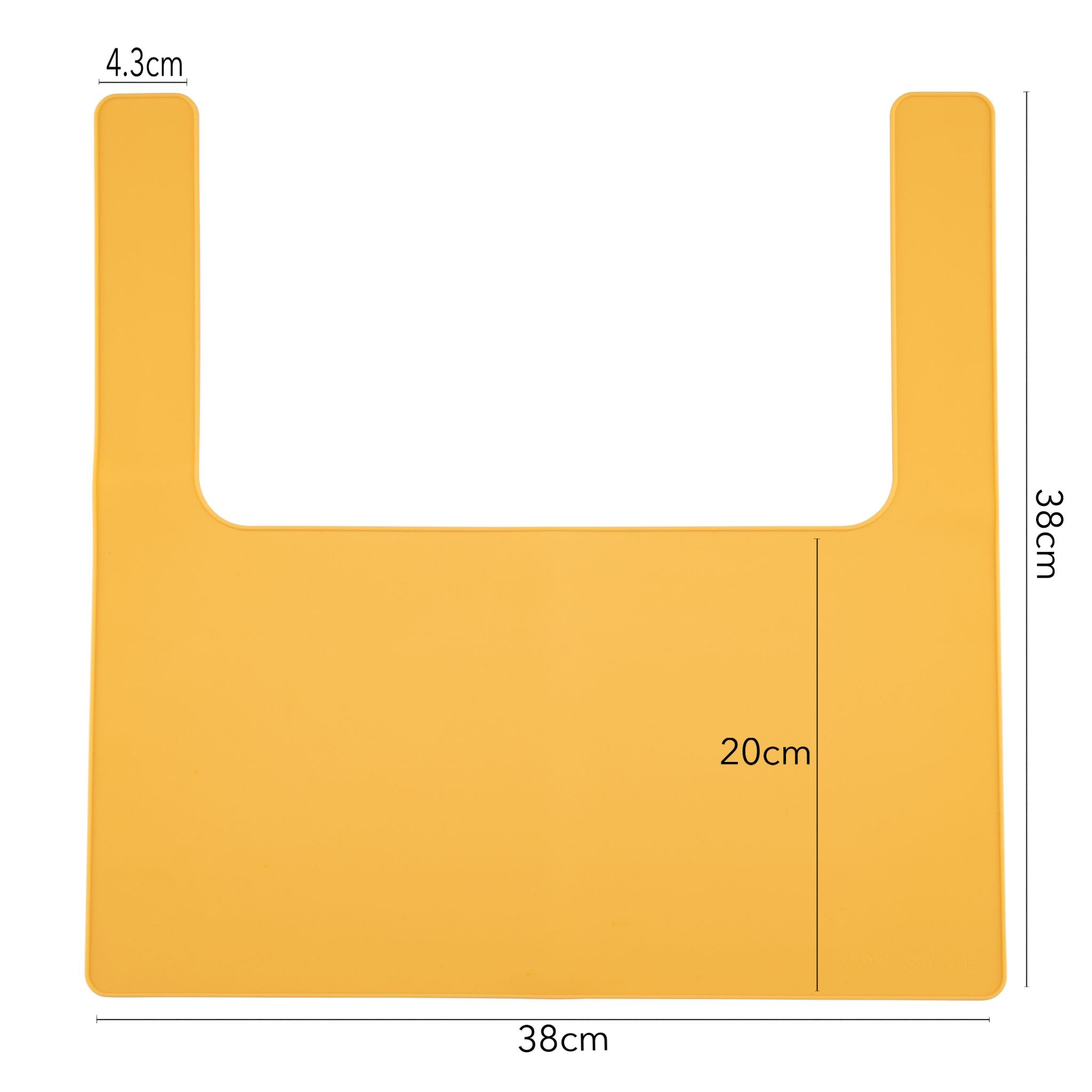 Yellow silicone placemat designed for IKEA highchair feeding.