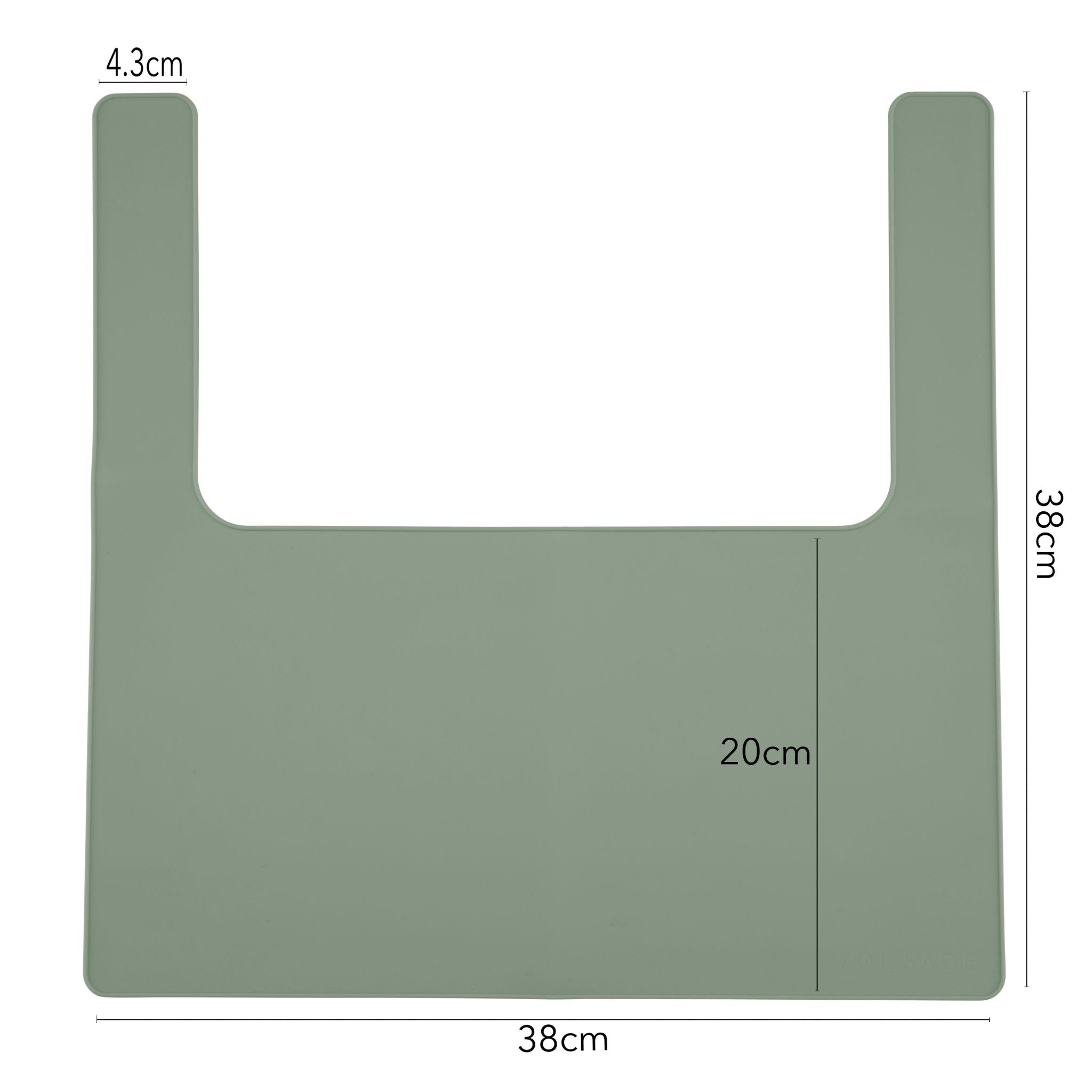 Green silicone placemat designed for IKEA highchairs, viewed from above angle.