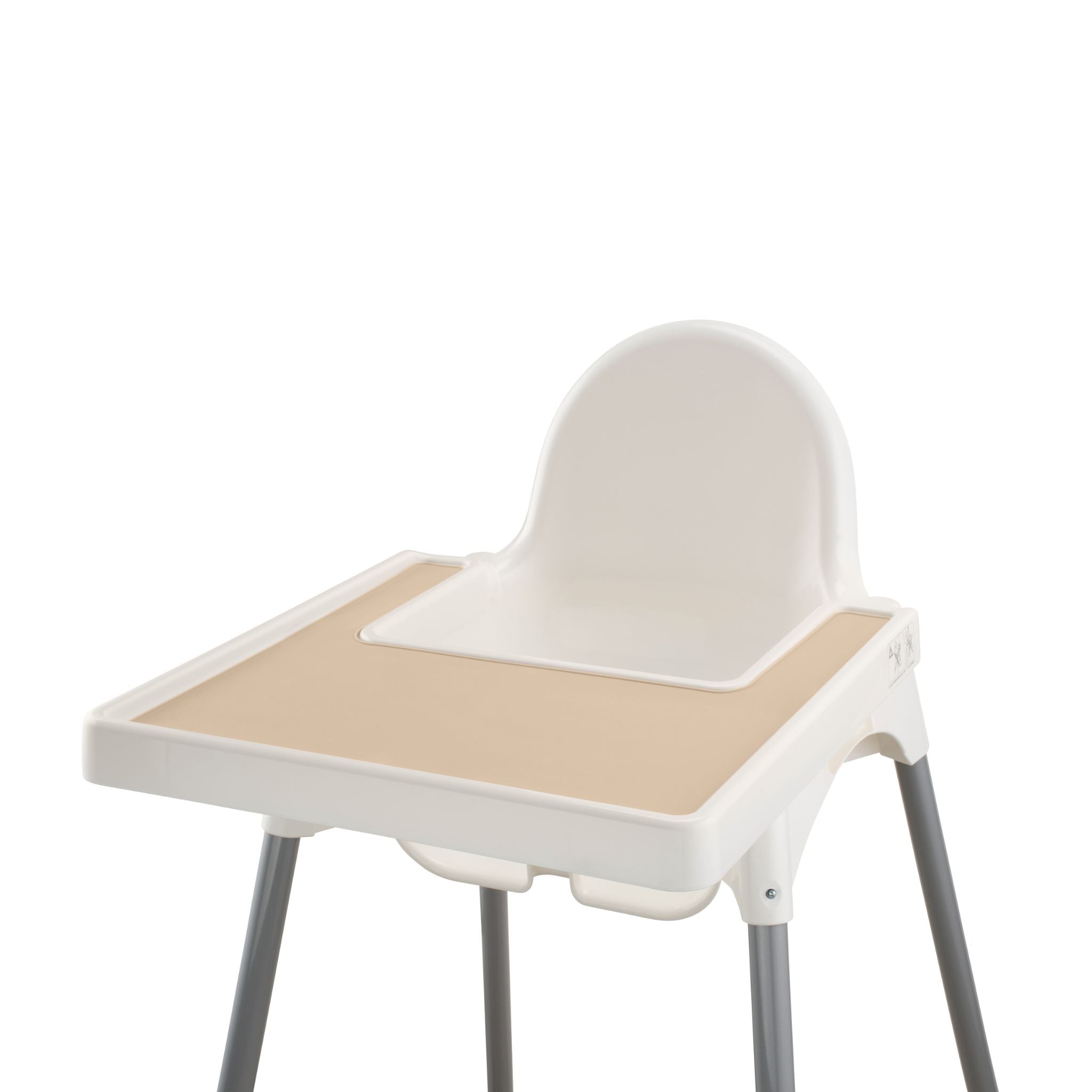 Beige silicone placemat attached to highchair tray for mess free feeding