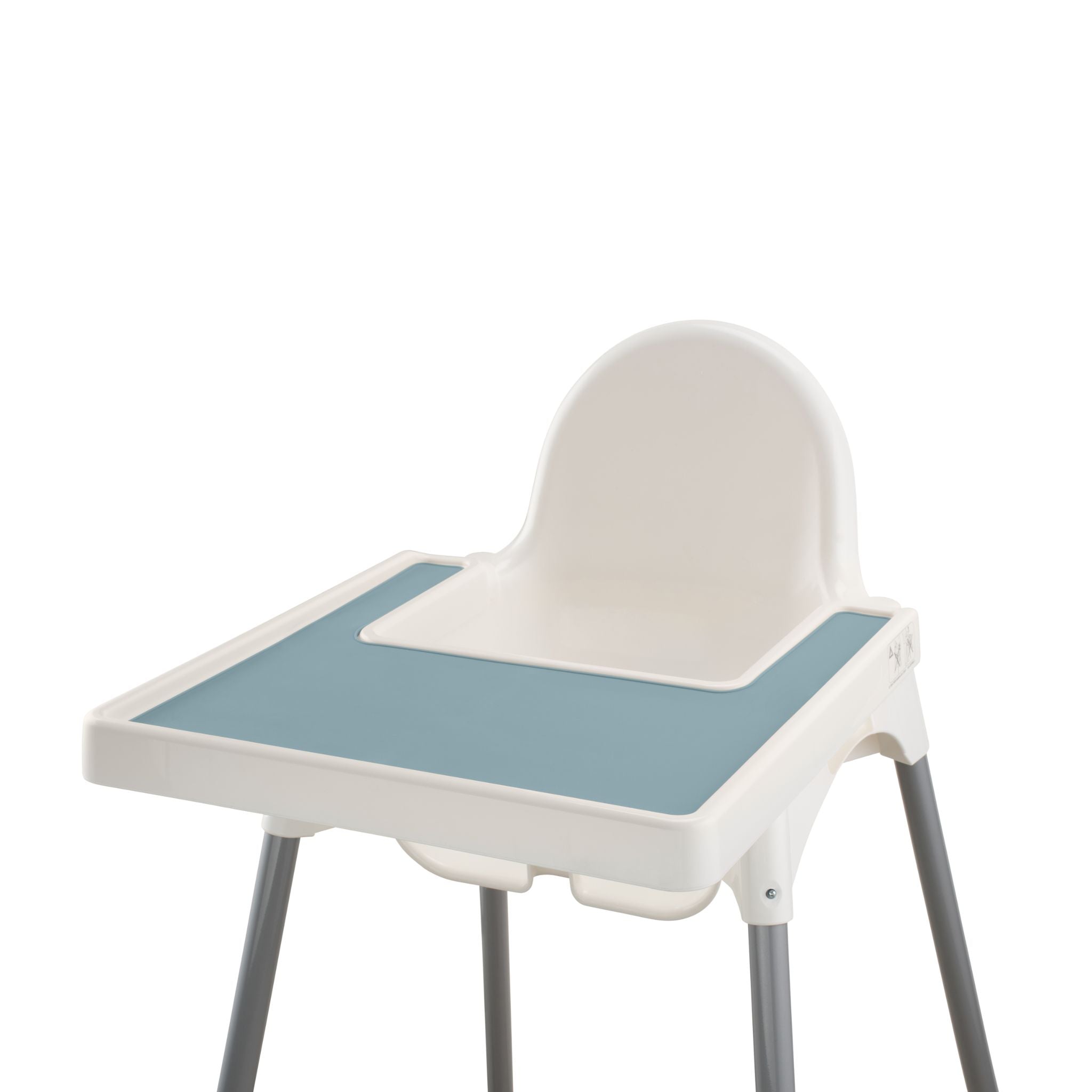 Blue silicone placemat attached to IKEA highchair tray during mealtime.