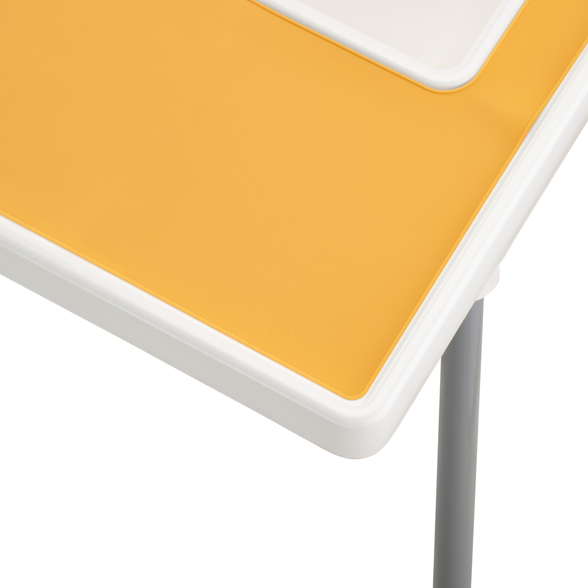 Yellow silicone placemat designed for IKEA highchair feeding time