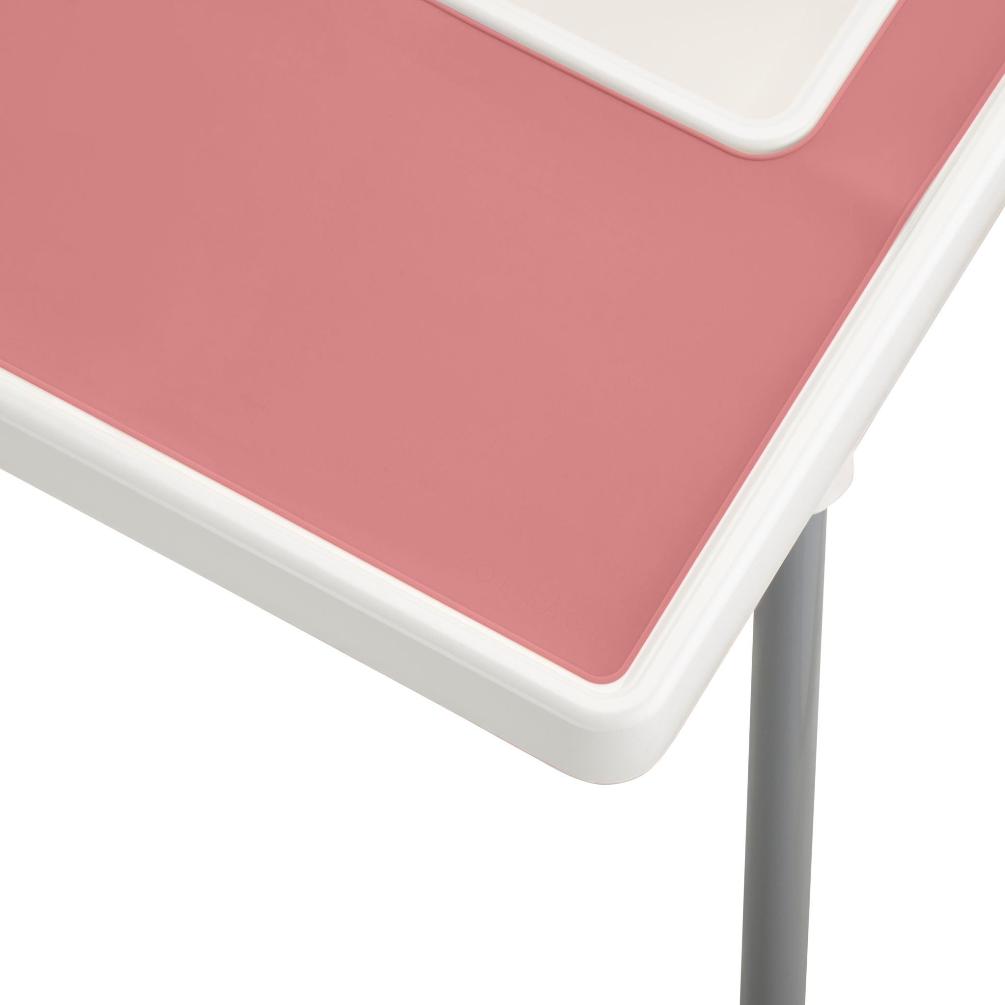Pink silicone placemat designed for IKEA highchair feeding time