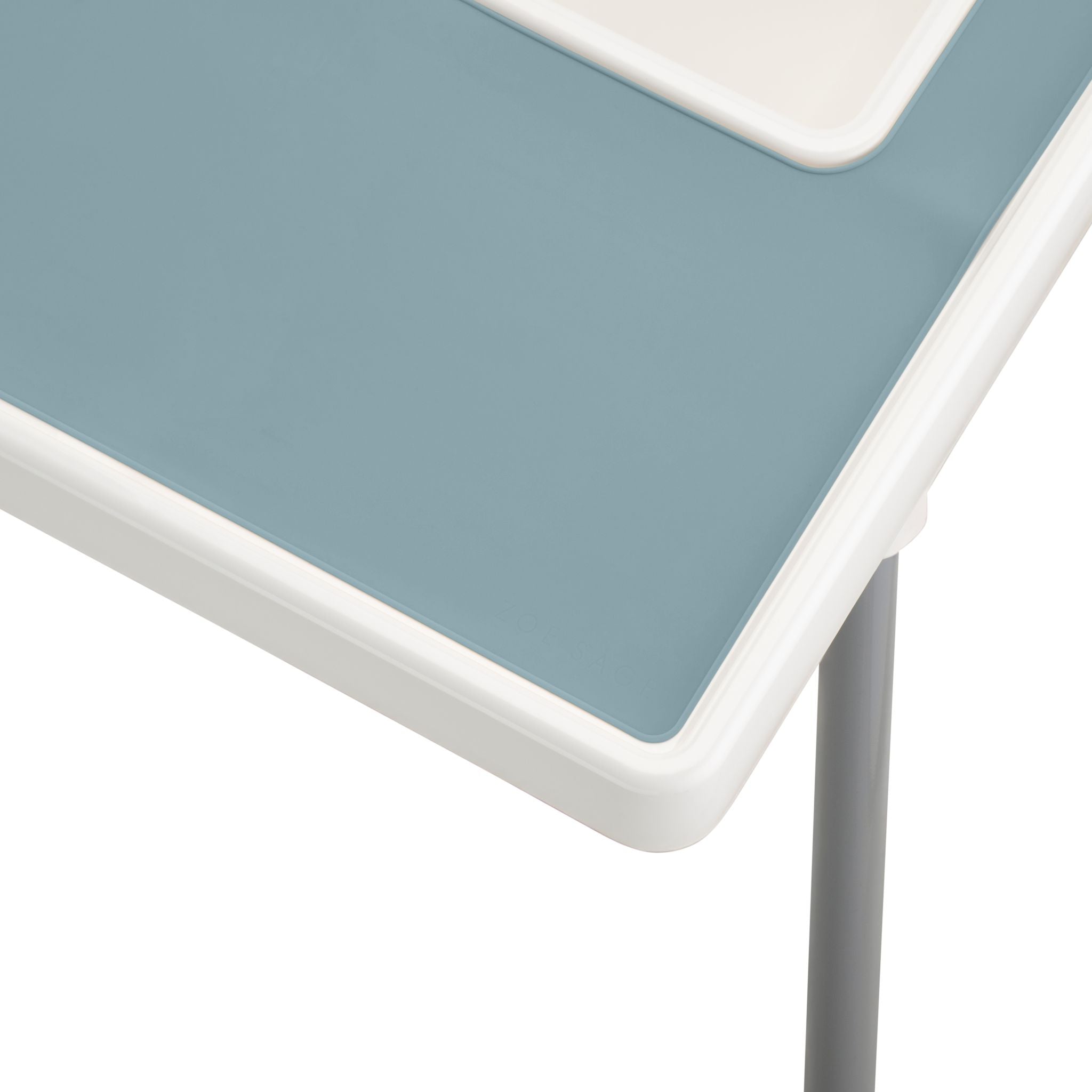 Blue silicone placemat designed for IKEA highchair feeding.
