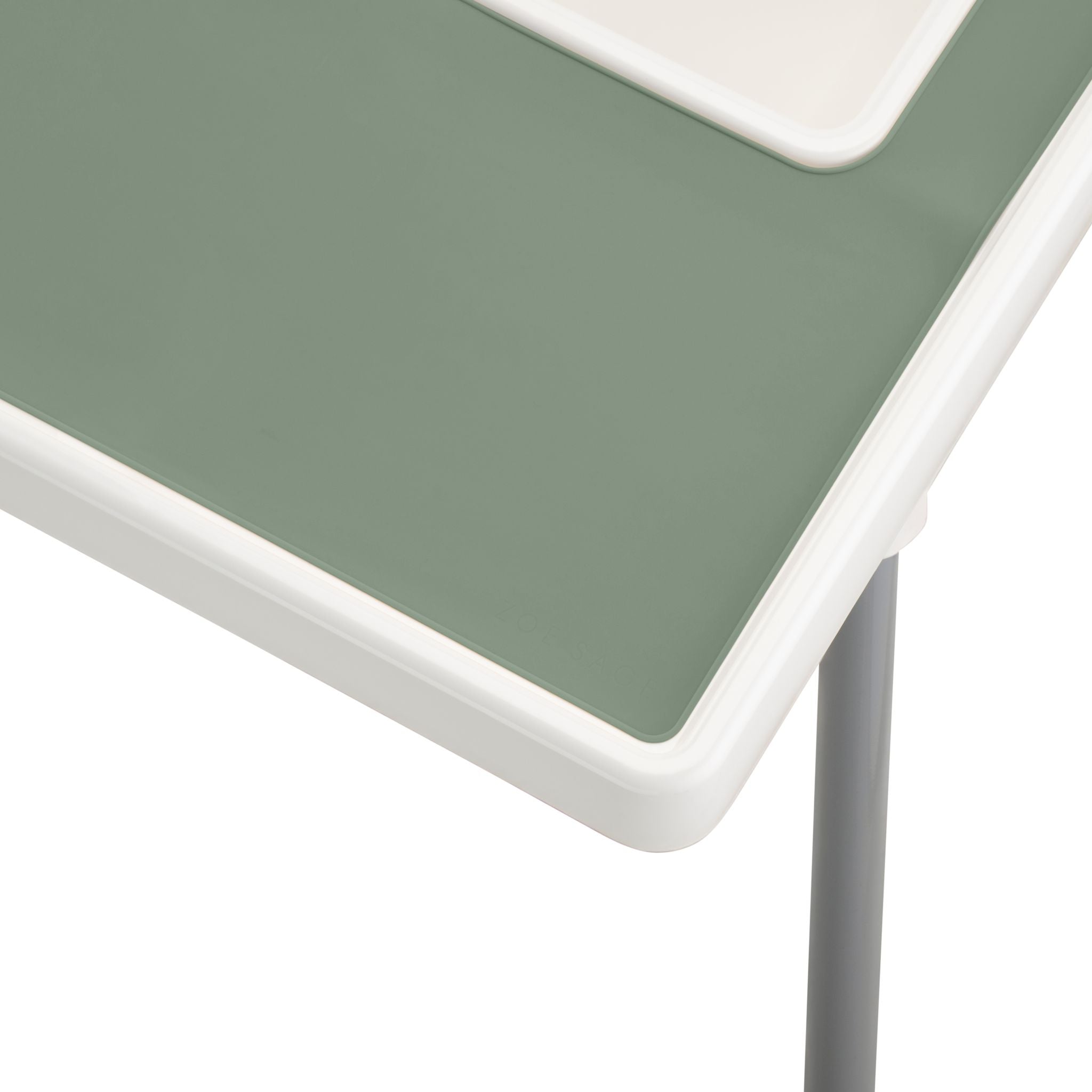 Green silicone placemat designed for IKEA highchair feeding time