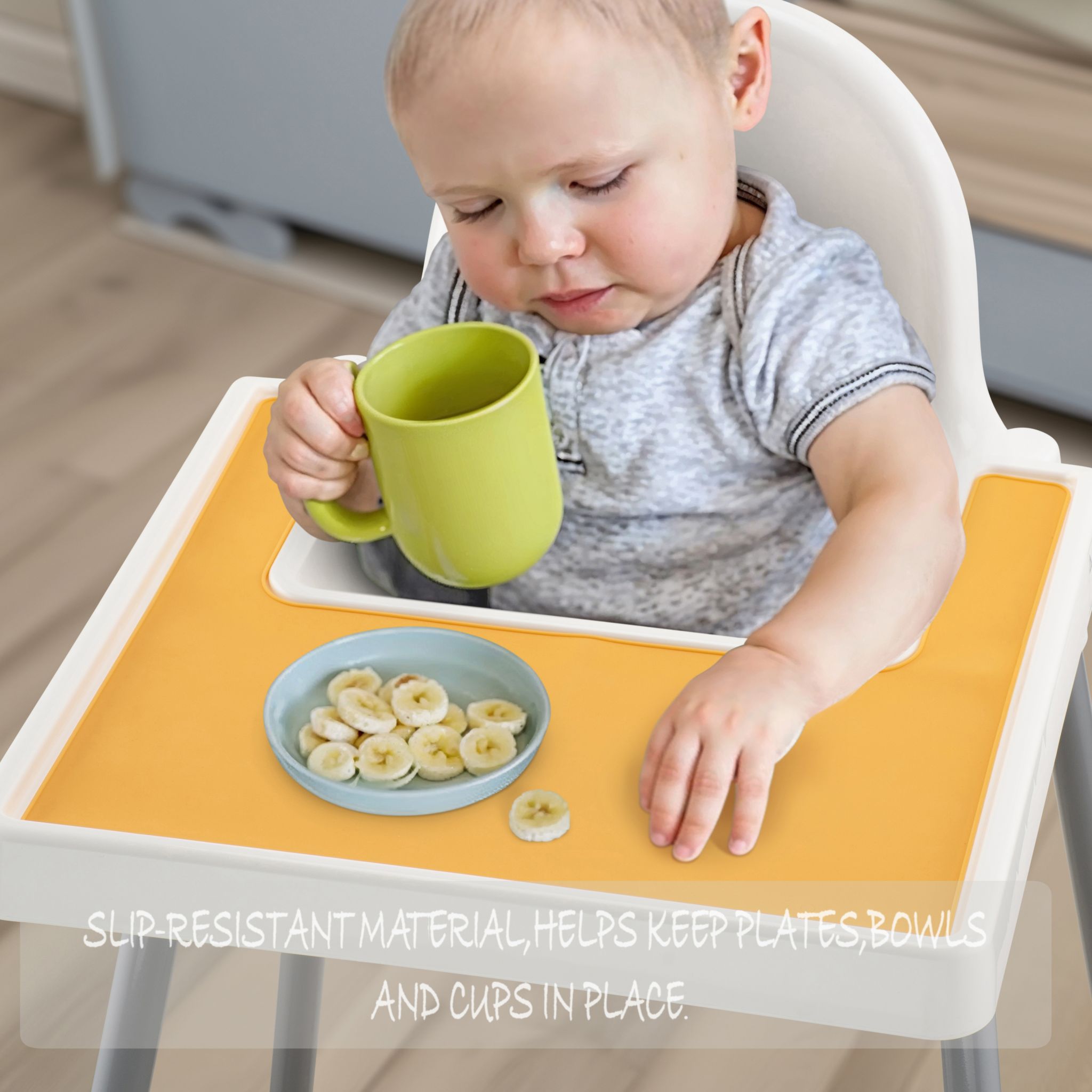 Yellow silicone placemat designed for IKEA highchair feeding time