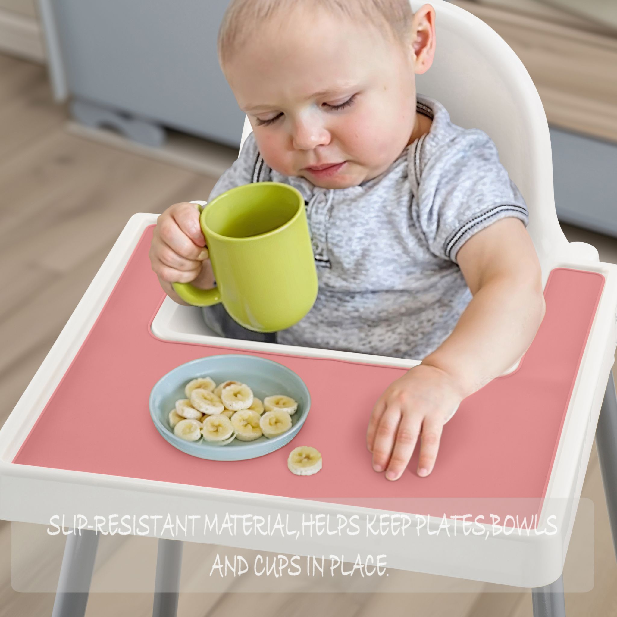 Pink silicone placemat designed for IKEA highchairs with textured surface