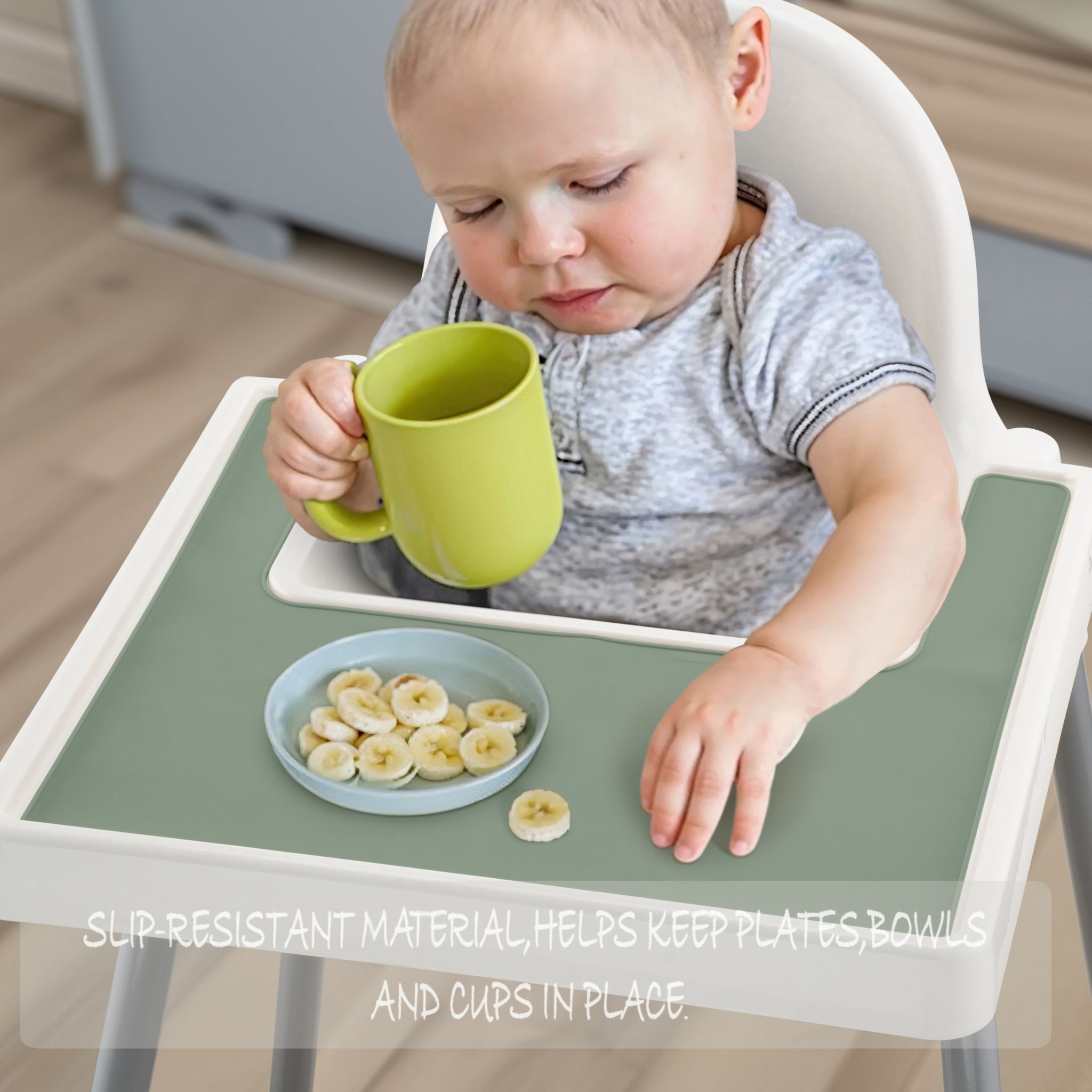 Green silicone placemat designed for IKEA highchair feeding time