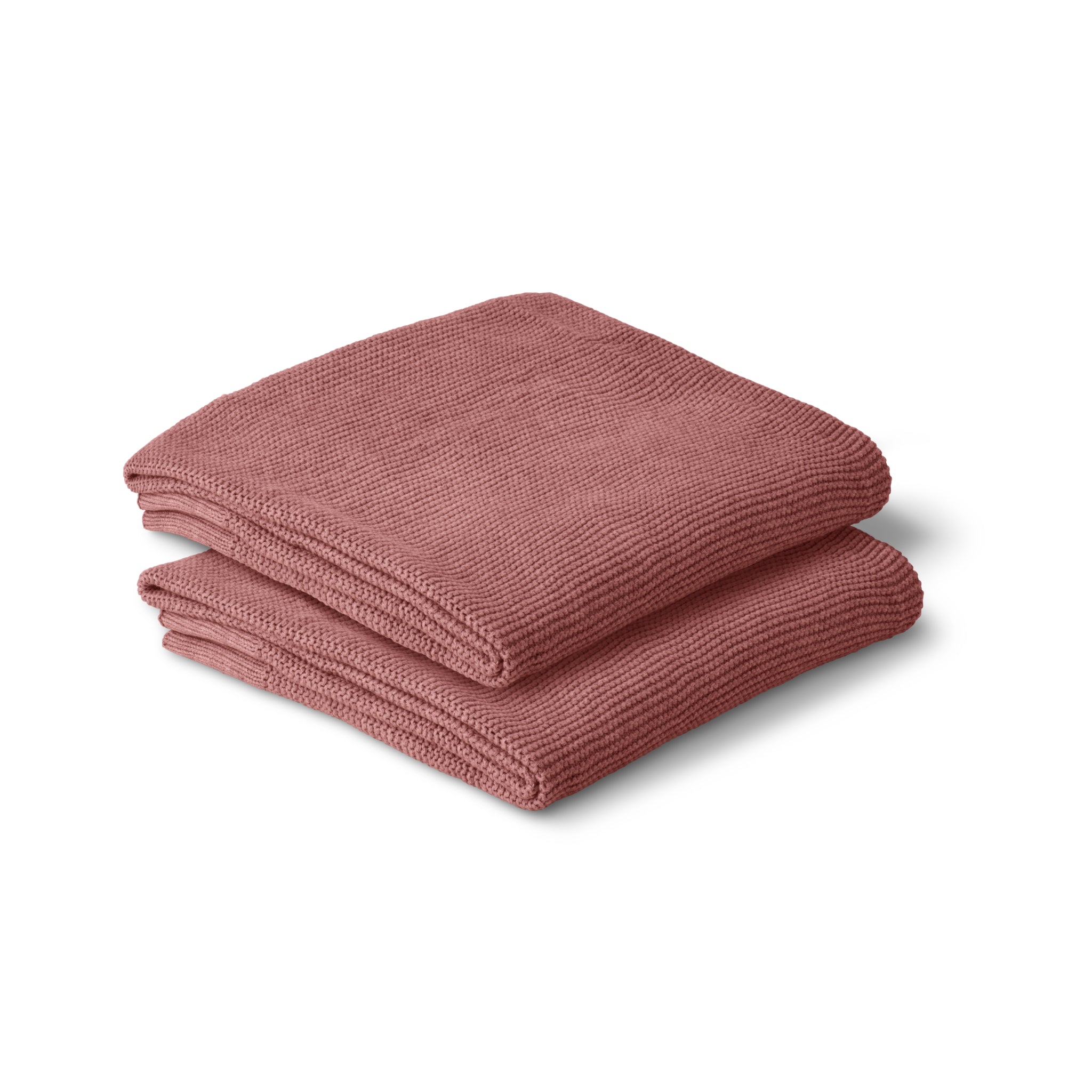 Soft plum cotton knit baby blanket draped gently by Zoe Sage