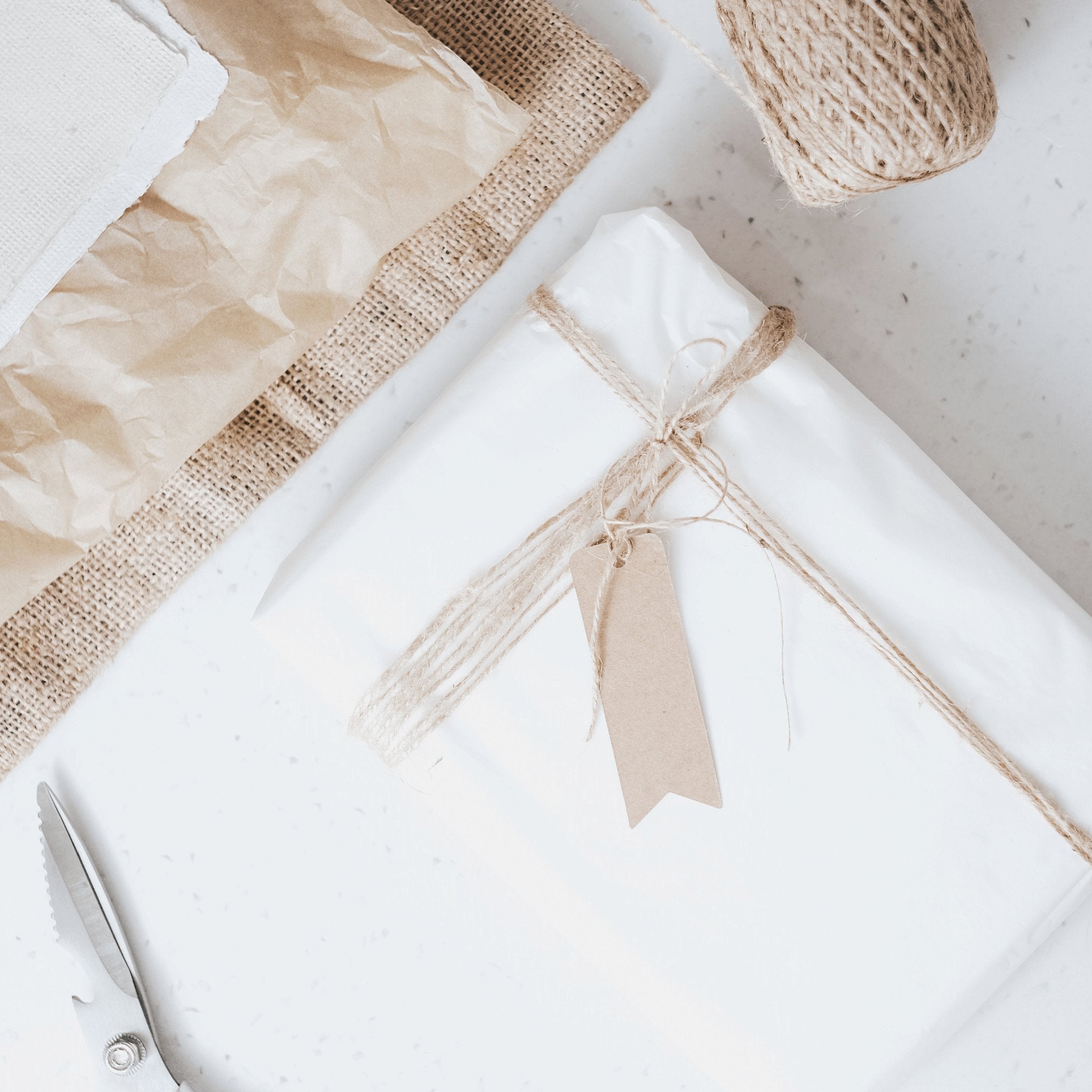 Sustainable gift wrapping roll in natural kraft paper by Zoe Sage