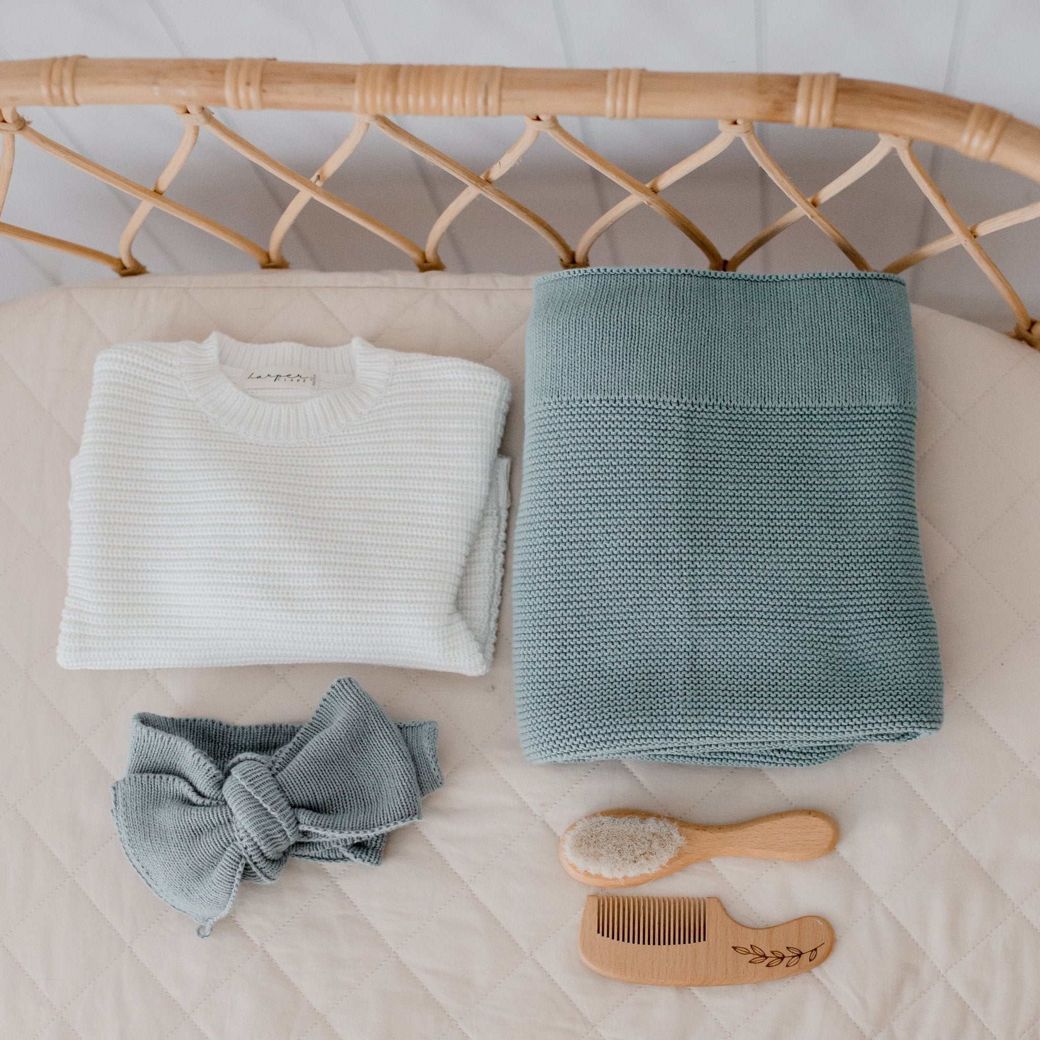 Mantis green organic cotton baby blanket and lovey comforter set in packaging
