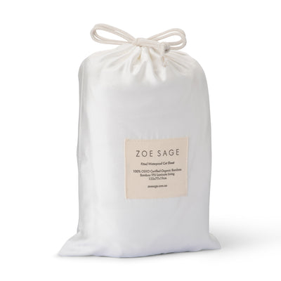 White waterproof fitted cot sheet in soft bamboo by Zoe Sage