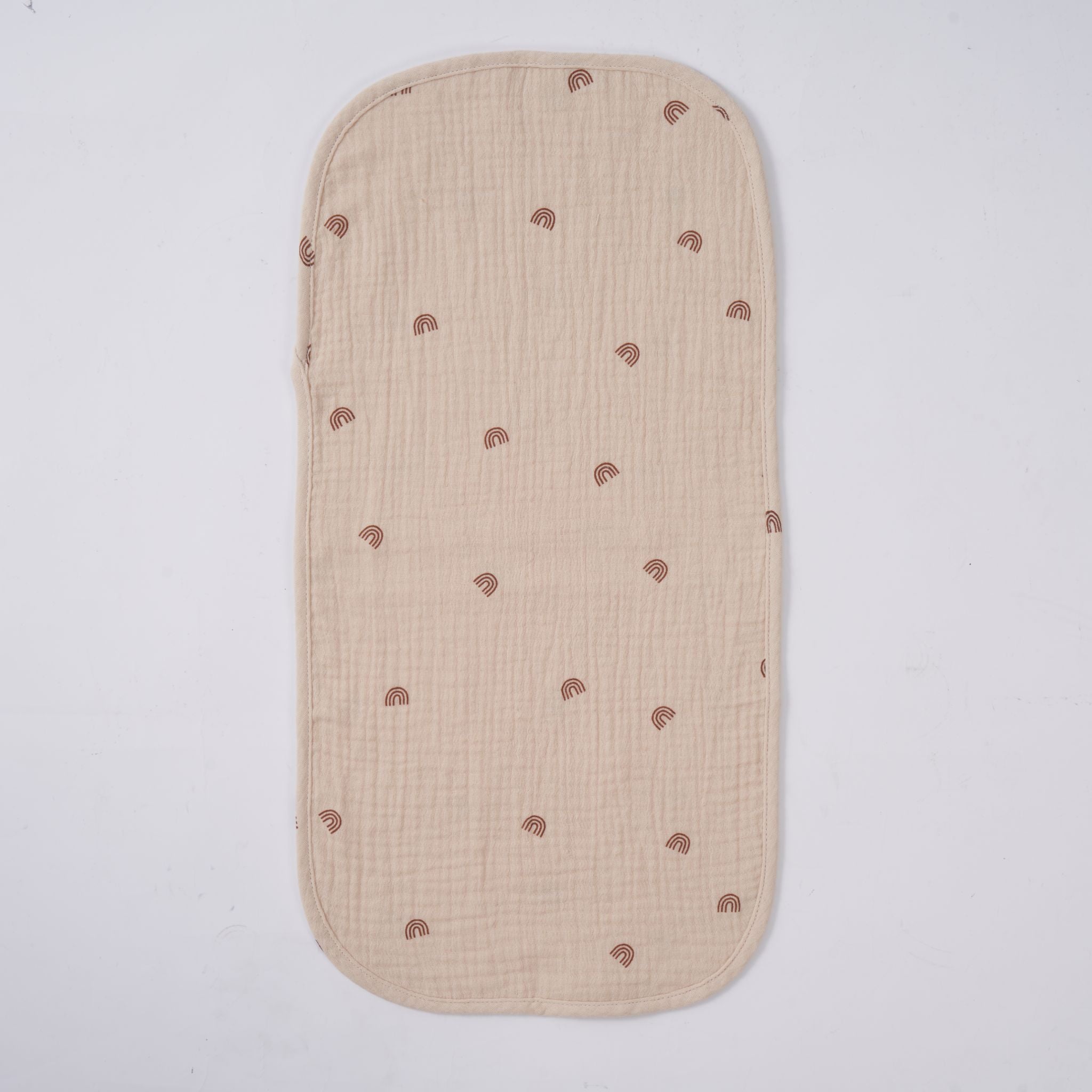 Organic muslin burp cloth in dusty dunes color, folded stack view