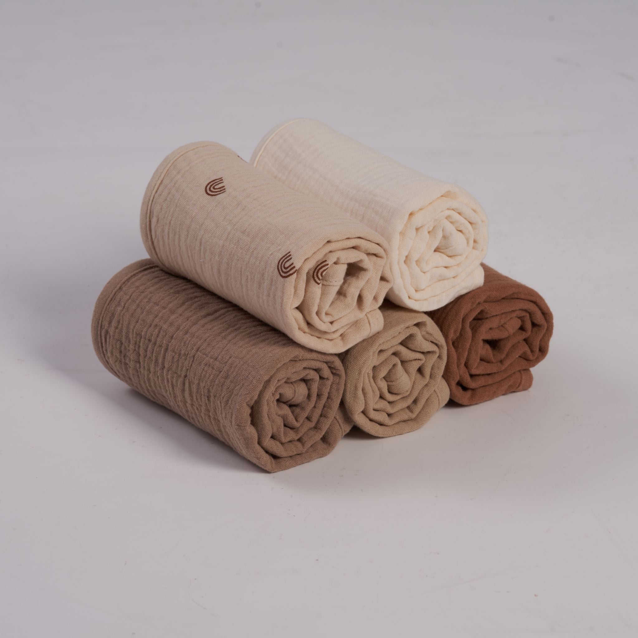 Organic muslin burp cloths in dusty dunes five pack by Zoe Sage