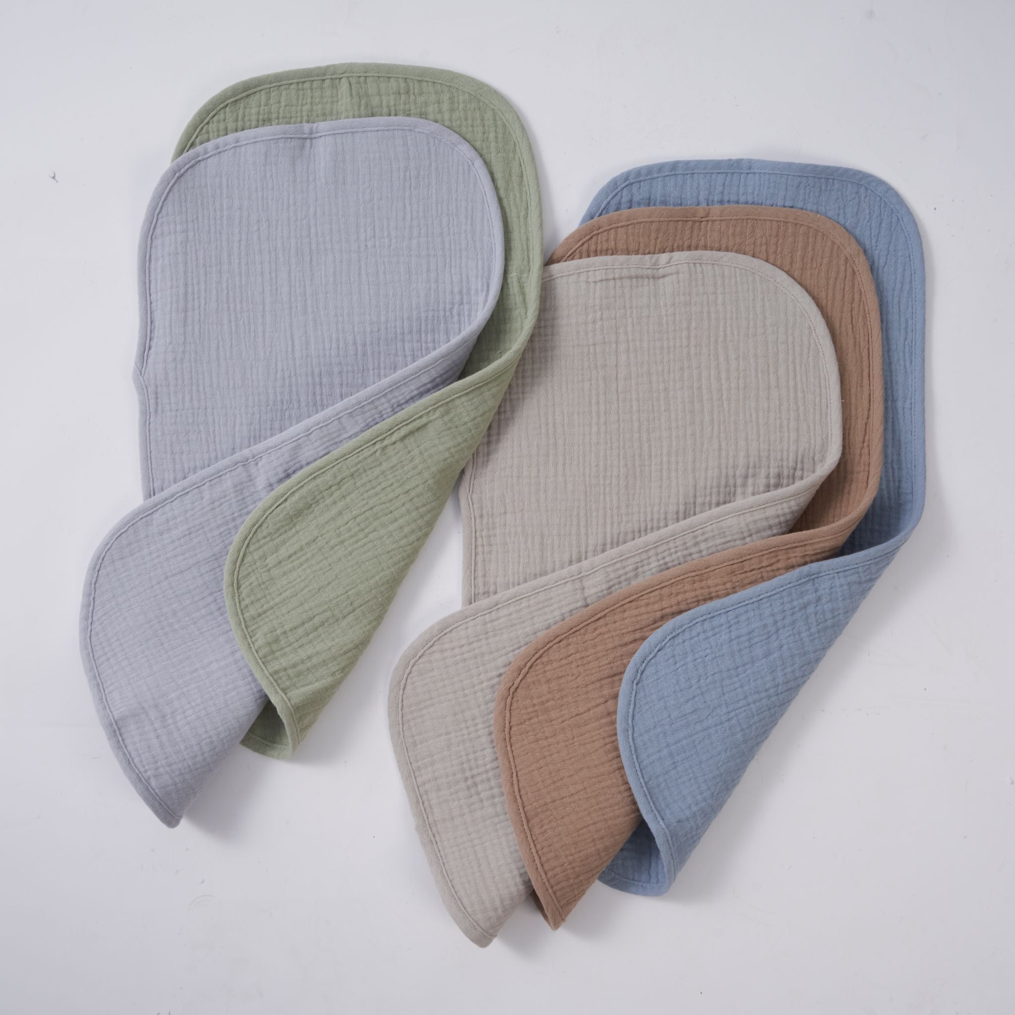 Organic muslin burp cloths in earth and sky colours, five pack set