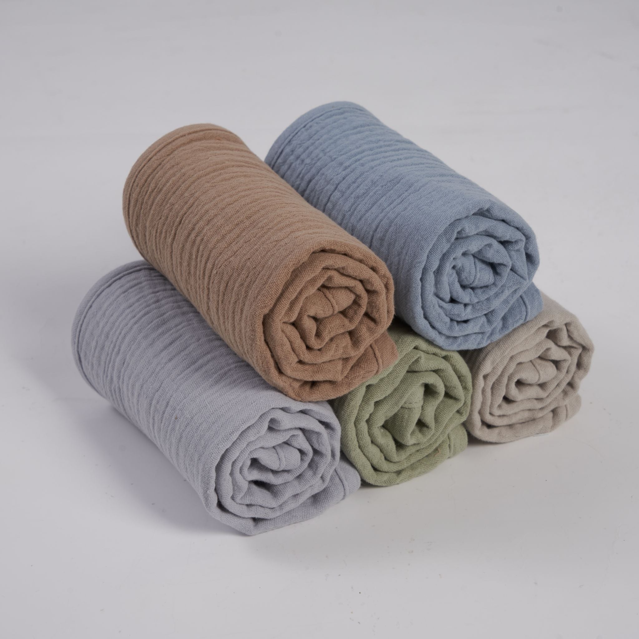 Organic muslin burp cloths in earth and sky tones by Zoe Sage