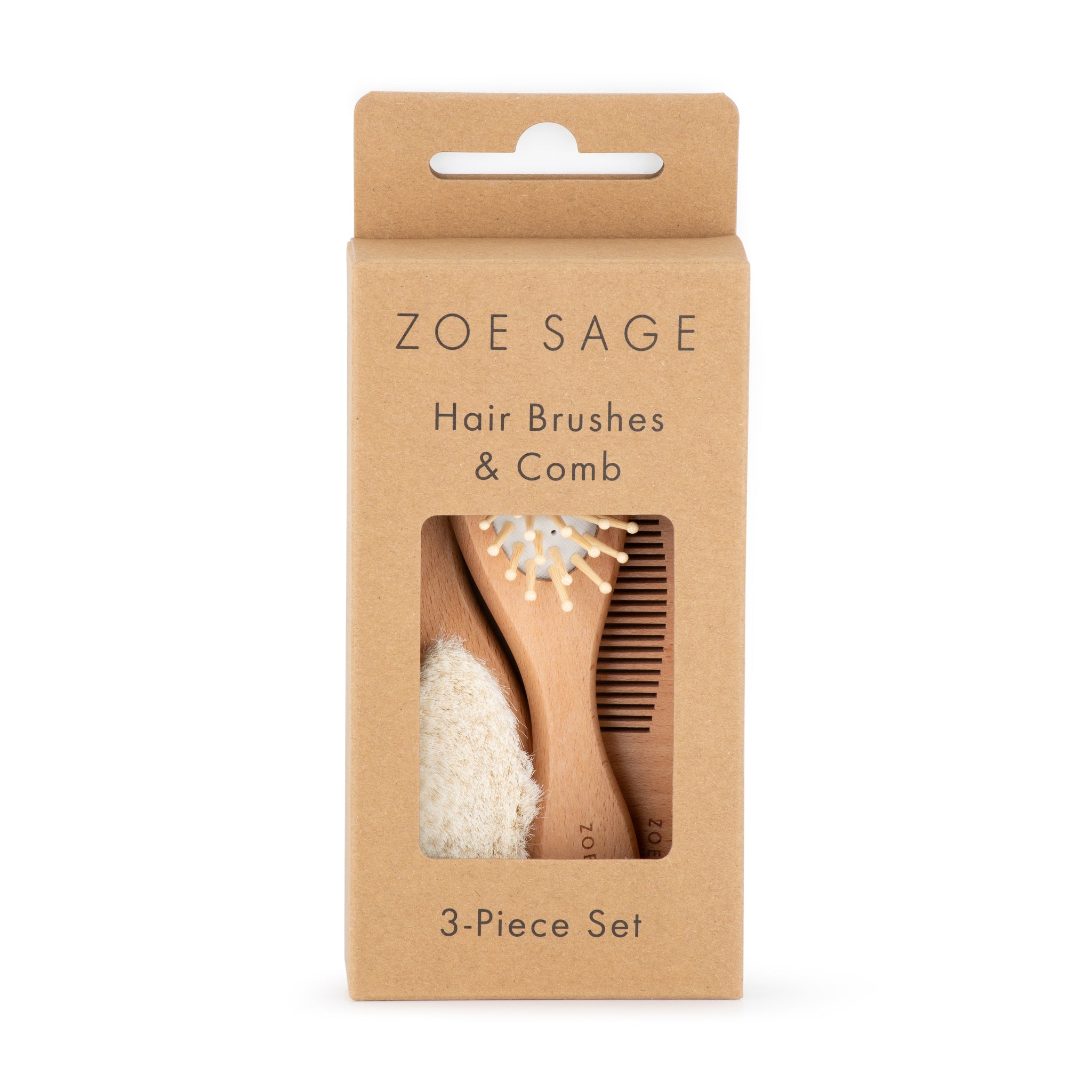 Wooden baby brush and comb set displayed on neutral fabric surface