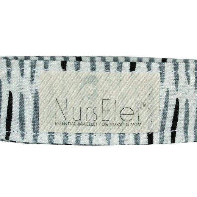 Midnight Meadow breastfeeding bracelet nursing reminder worn on wrist by Zoe Sage