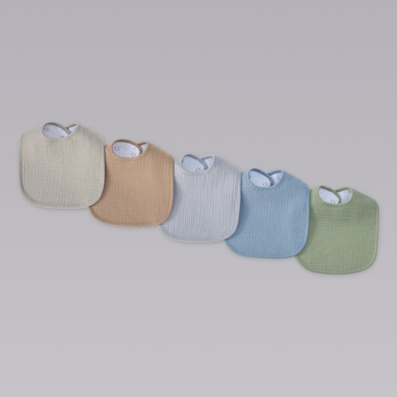 Organic muslin baby bibs in earth and sky tones by Zoe Sage, five pack colour fan