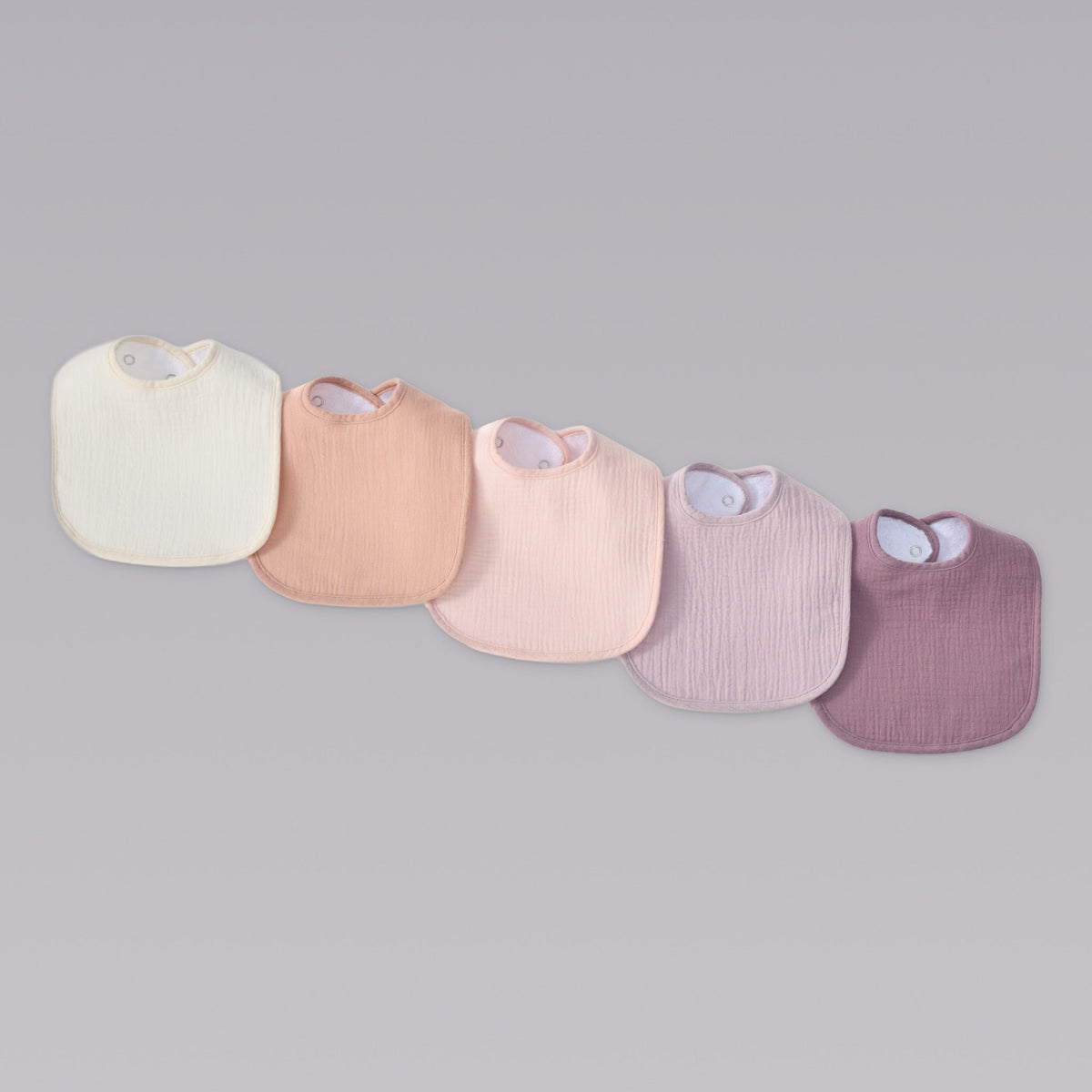 Organic muslin bibs in Lavender Blush
